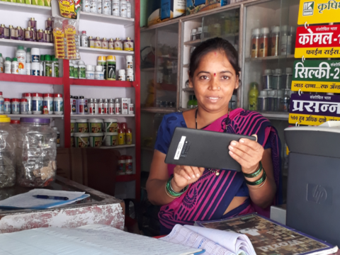 Woman entrepreneur India shop tablet