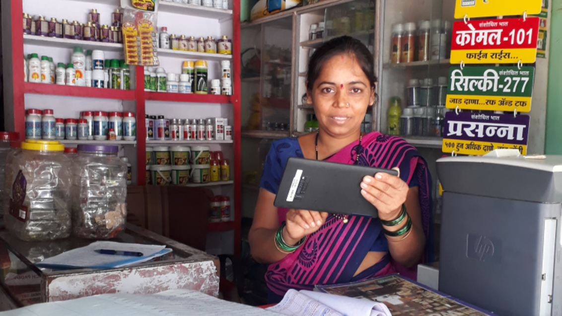 Woman entrepreneur India shop tablet