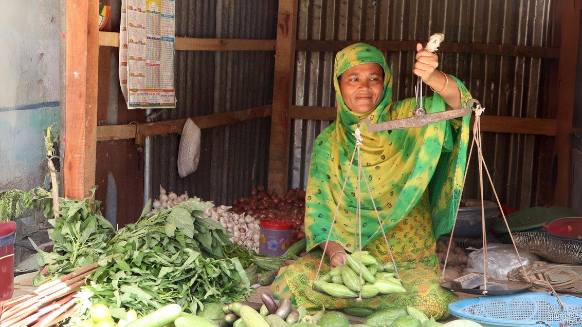 Woman selling vegetables in Bangladesh