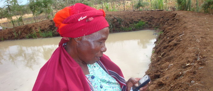 Lady farmer mobile phone